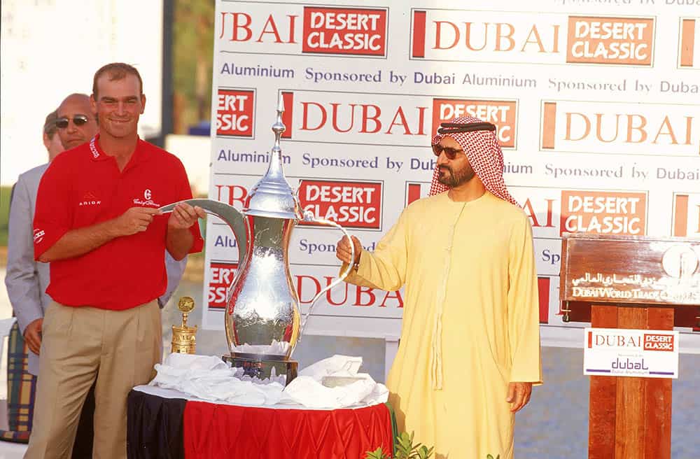 4 Mar 2001: Thomas Bjorn of Denmark receives the trophy from Sheikh Mohammed after victory in the Dubai Desert Classic at the Emirates GC in Dubai. Mandatory Credit: David Cannon /Allsport