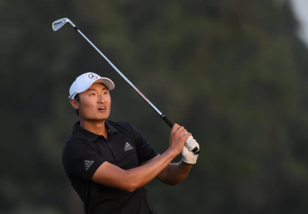 Haotong Li Leads but Rory McIlroy lurks at Omega Dubai Desert Classic
