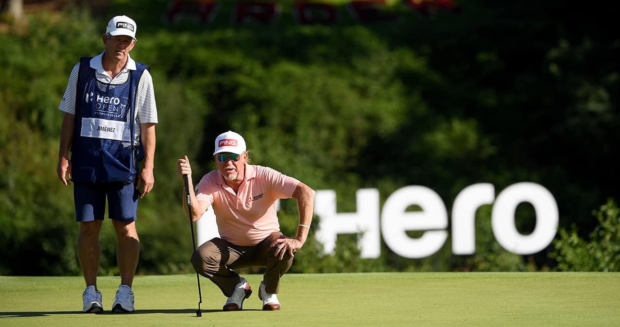 Miguel Angel Jimenez of Spain lines up his putt at the Hero Open